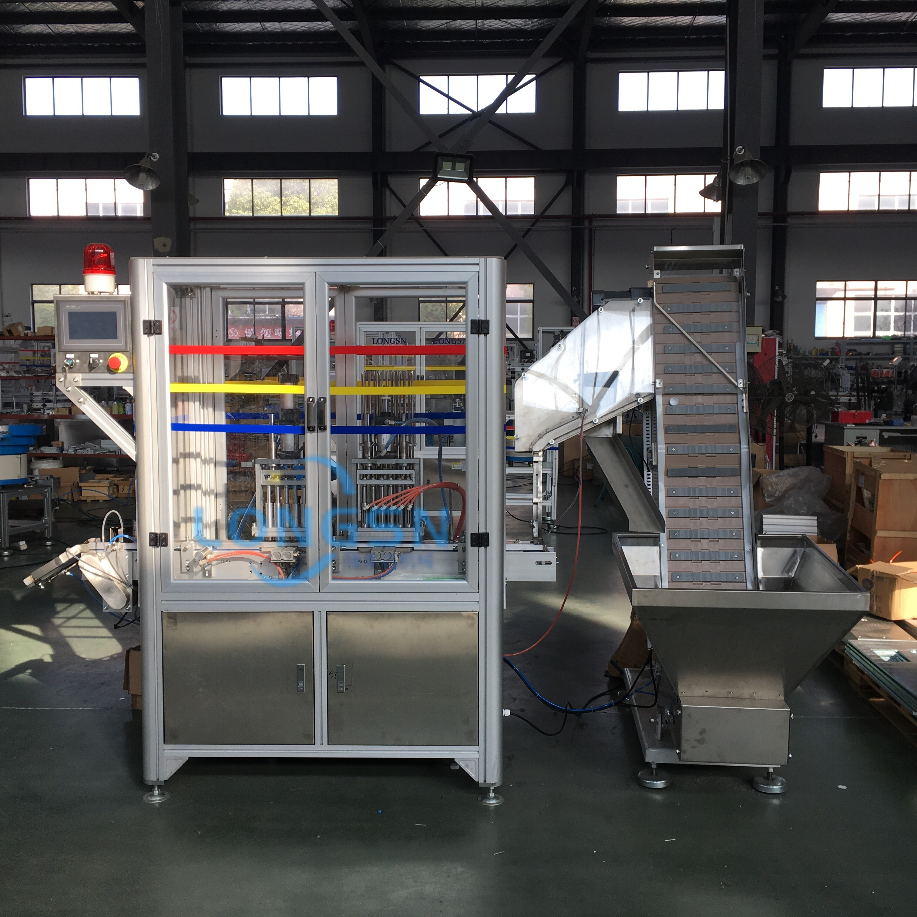 M&aacute;quina de montagem de tampa