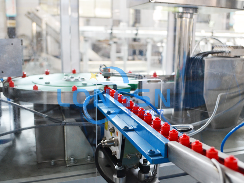 M&aacute;quina de montagem de tampa