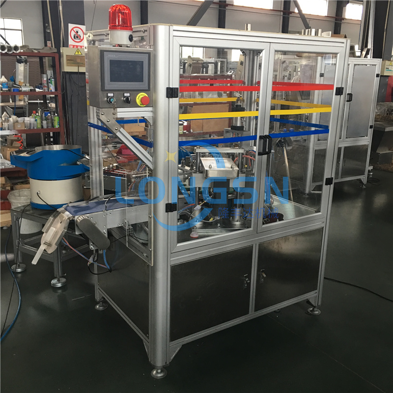 M&aacute;quina de montagem de tampa