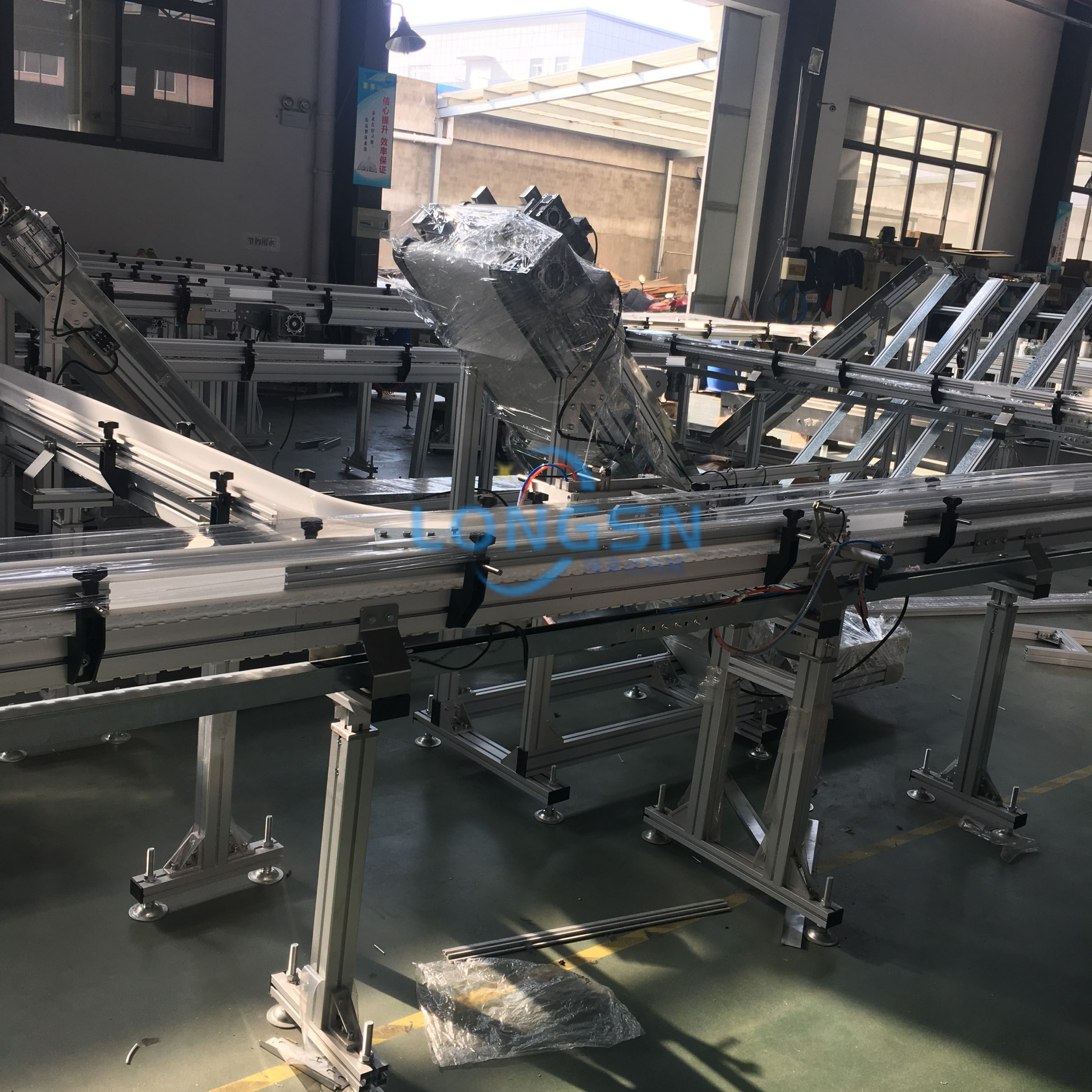 Sistema de transportador de garrafas